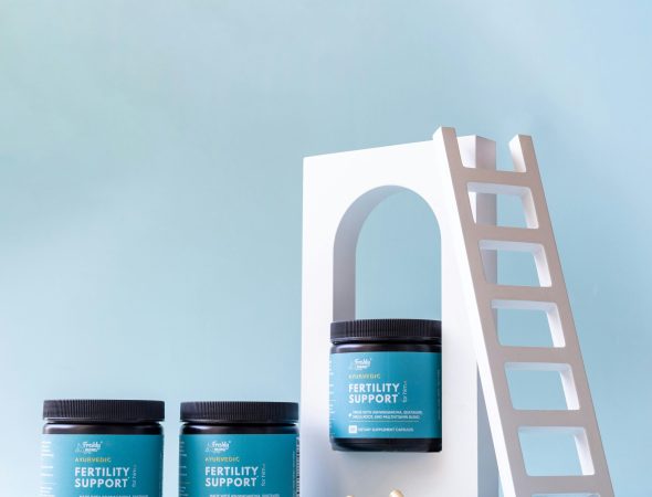 a set of three jars of sea salt next to a ladder